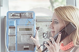 Young girl calling by phone