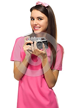 Young girl with camera isolated