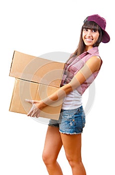 Young girl with cardboard boxes