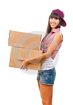 Young girl with cardboard boxes