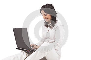 Young girl chatting on a PC