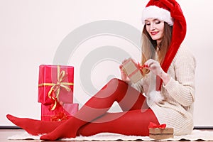 Young girl in christmas outfit.