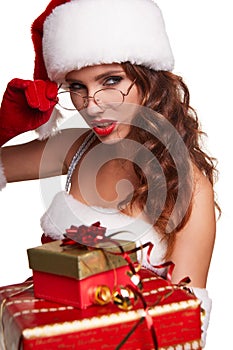 Young girl in christmas outfit. Woman with ribbon box gift. Sant