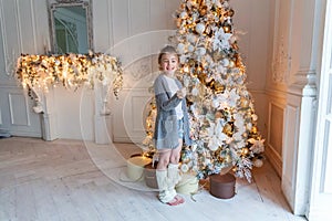 Young girl with Christmas sparkler