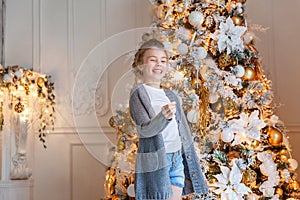 Young girl with Christmas sparkler