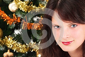 Young girl and christmas tree