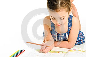 Young Girl Coloring a Picture