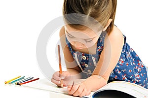 Young Girl Coloring a Picture