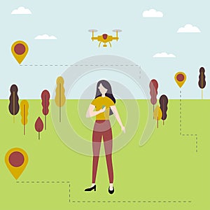 Young girl controls the drone outdoors