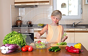 Young Girl Cooking. Healthy Food - Vegetable Salad. Diet. Dieting Concept. Healthy Lifestyle. Cooking At Home. Prepare Food.