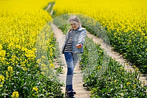 Young girl on a on country road