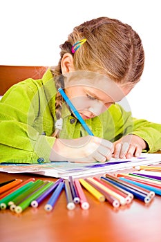 Young girl and crayons