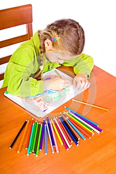 Young girl with crayons