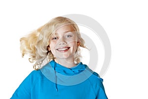 Young girl dances with flying hair