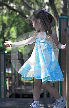 Young girl dancing in a playground