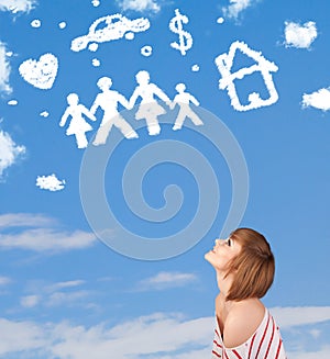 Young girl daydreaming with family and household clouds