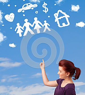 Young girl daydreaming with family and household clouds