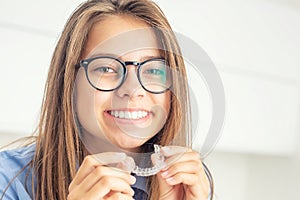 Young girl with dental invisible braces