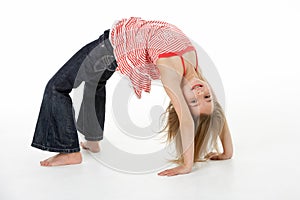 Young Girl Doing Backflip In Studio