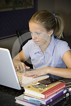 Young girl doing home work