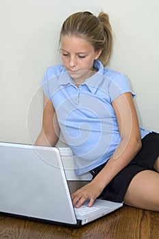 Young girl doing home work