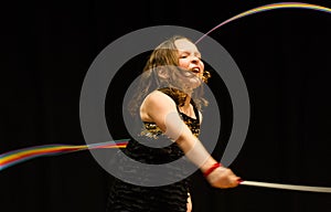 Young girl doing ribbon dance