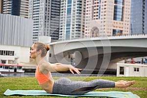 Young girl doing yoga in Dubai city