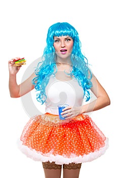 Young girl doll with blue hair. plastic eating a