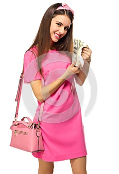 Young girl with dollars isolated