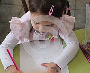 Young Girl Drawing a Picture