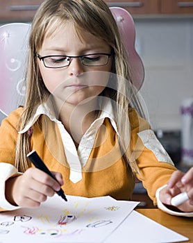 Young girl drawing pictures