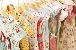 Young girl dresses in shop display