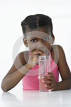 Young Girl Drinking Mocktail photo