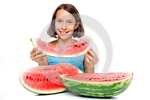 Young girl eating watermelon