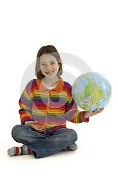 Young girl embracing the world globe