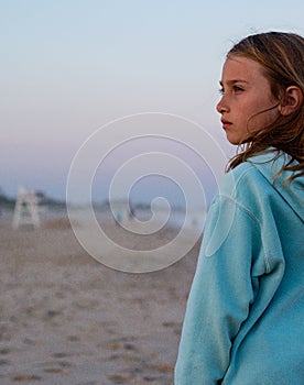 Young girl on empty beach