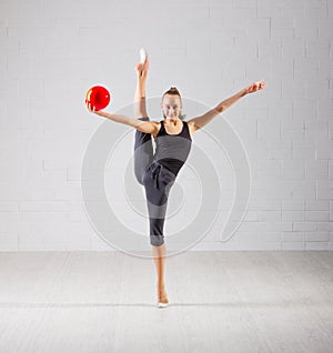 Young girl is engaged in art gymnastics