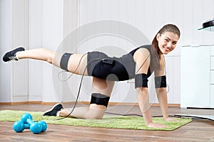 A young girl is engaged in fitness