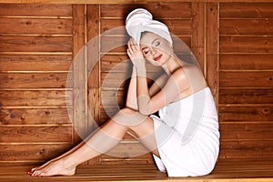 Young girl enjoying sauna