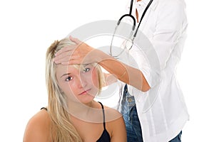 Young girl examined by doctor