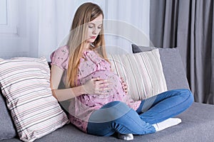 Young girl expecting childbirth soon photo