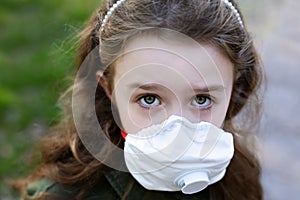 Young girl with a face mask