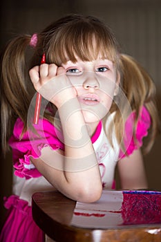 Young girl with felt-tip pen