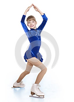 Young girl figure skating.