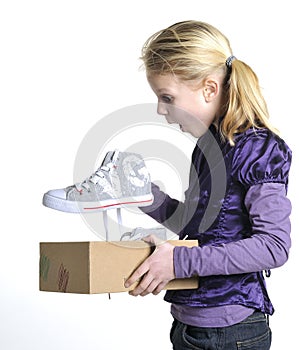 Young girl is flabbergasted over her new shoes