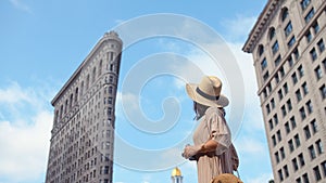 Young girl at the Flatiron building, NYC