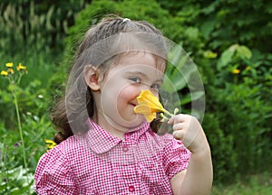 Young girl with flower