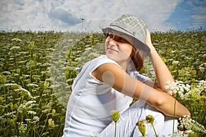 Young girl in a flower field