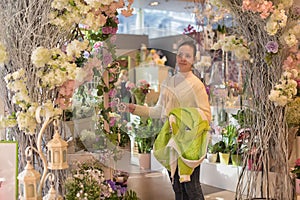 Young girl in a flower shop