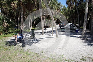 Young girl at Fort De Soto Park campsite in Pinellas County, Florida.